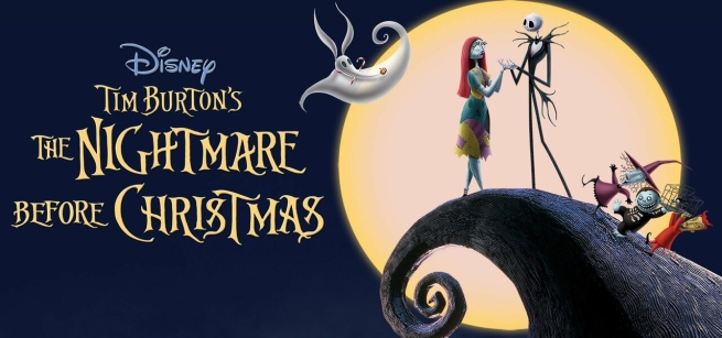 couple on cliff next to moon