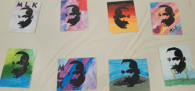 various stencil art pieces with MLK Jr's face