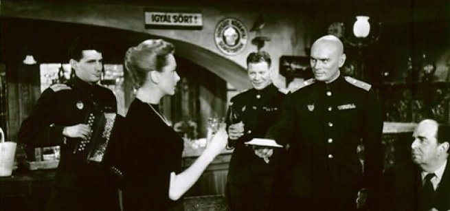 four men and one woman attending an event 