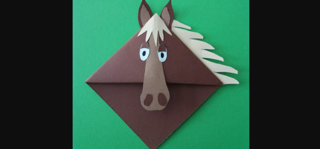 Brown paper origami horse with hair 