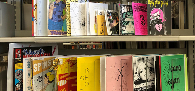 A collection of different colored zines