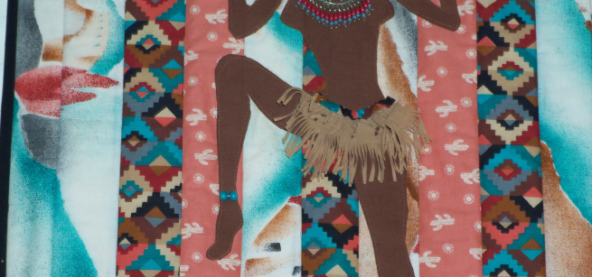 Picture of a Quilt with image of women embedded into the fabric