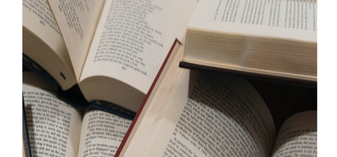 several open books with text