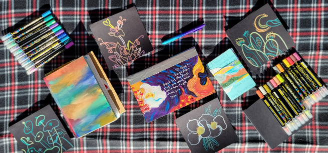 Photos of journals and coloring materials.