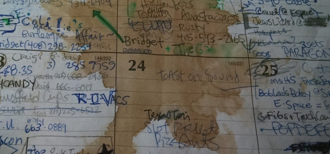 punk zine with a large coffee stain on a vintage calender