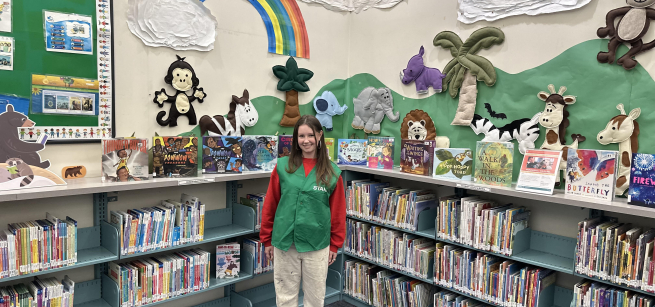 Picture of star reader standing in the children's area