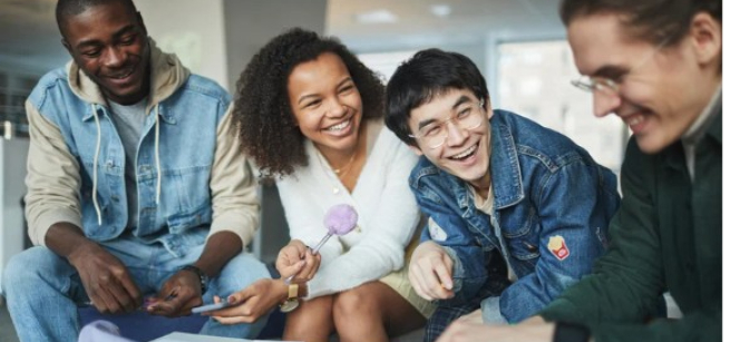 A group of happy adults talking and laughing together