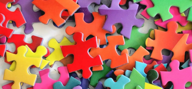 Image of puzzle pieces in vibrant colors