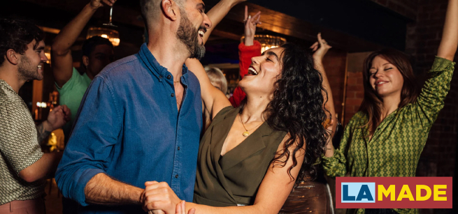 people happily salsa dancing