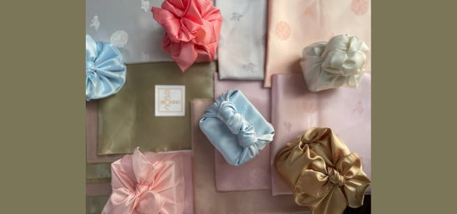 six wrapped presents in the style of bojagi 