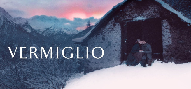 Vermiglio title card, a man and a woman embrace each other in a farm's shed doorway