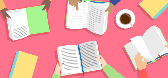 books open on pink table