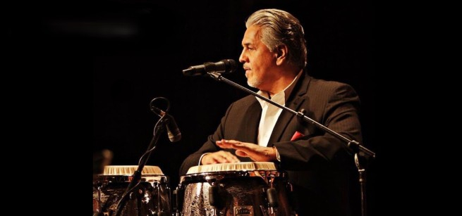 Musician creating rhythm with his drums.