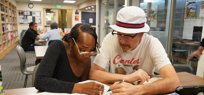 tutor with adult learner