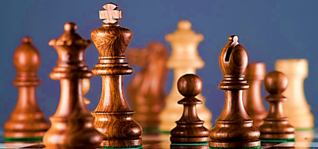 Chess board and chess pieces are in the picture