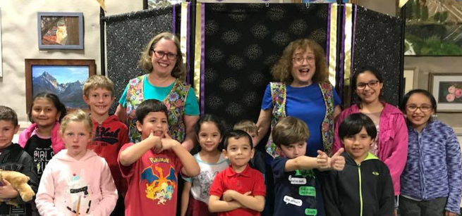 A group of children and adults