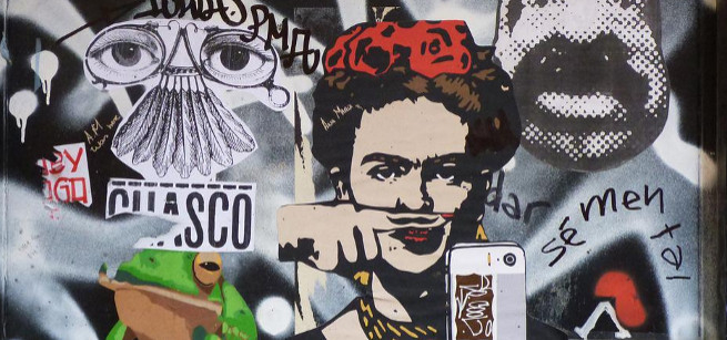 collage with image of frida kahlo using her finger as a moustache