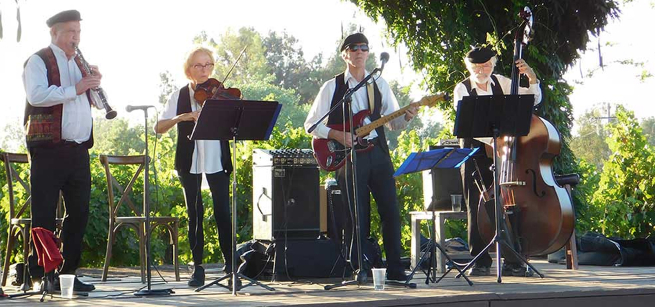 Klezmer band performing in a park