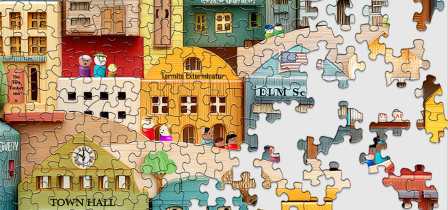In the picture is an unfinished puzzle of a town
