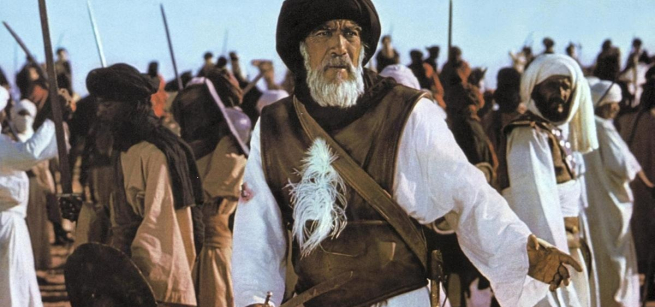 armed Arab men in traditional clothes getting ready for a battle