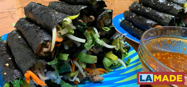 plate of stacked mini kimbap 
