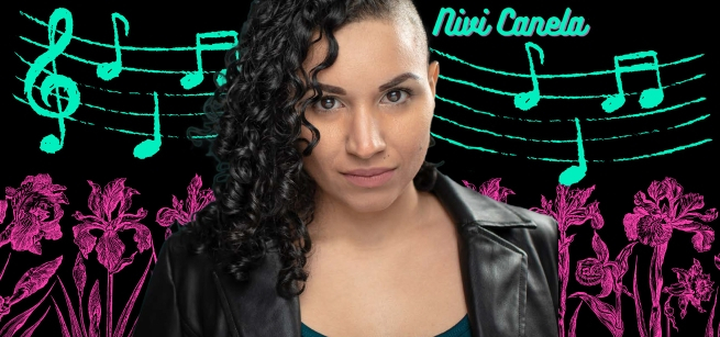 Nivi Canela in front of neon musical notes drawing