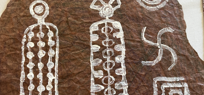 Painted paper with rock art designs