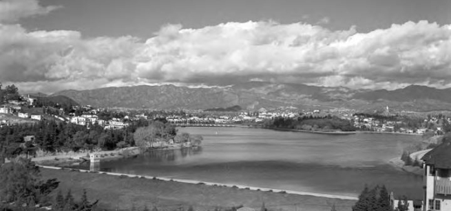 reservoir with mountains and clouds
