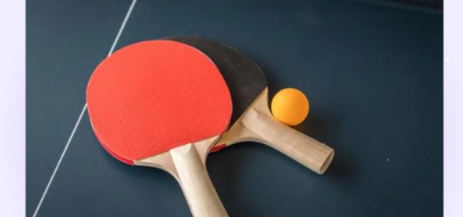 ping pong paddles on a table