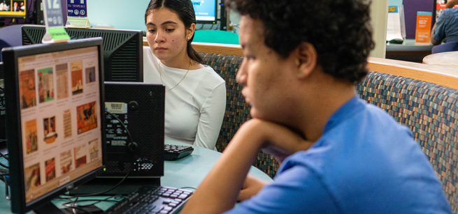 teens studying at computer