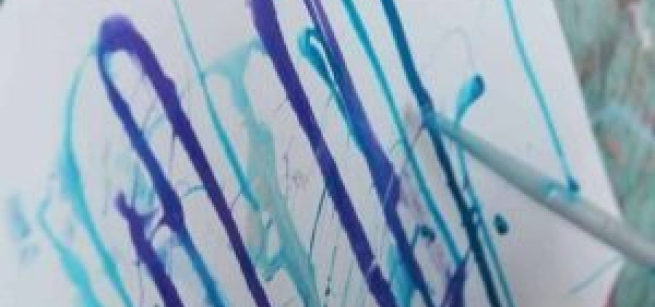 dripping paint on a canvas