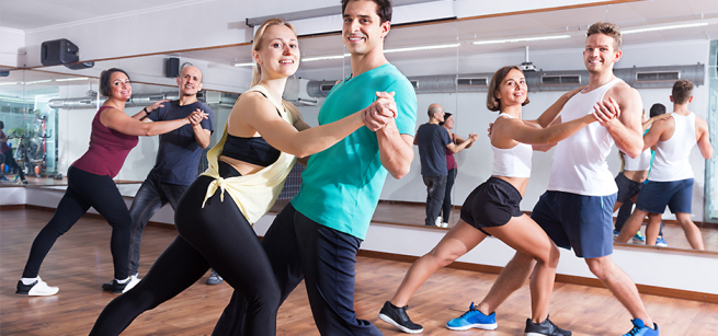 Three couples dancing in a studio