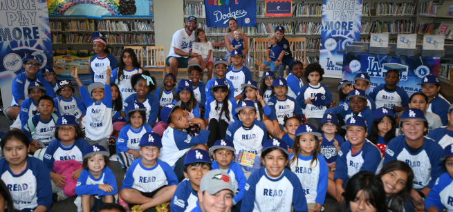 Children attending a Dodgers Storytime posing for a group photo