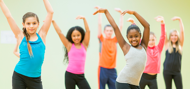 A group of young girls dancing