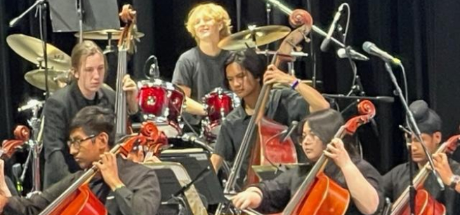 A group of students from Marshall HS playing instruments