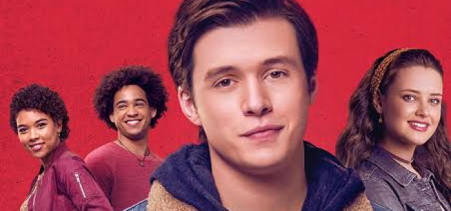 A movie poster with teen boys and girls