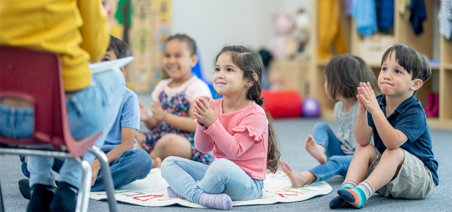 toddler sitting and listening at storytime