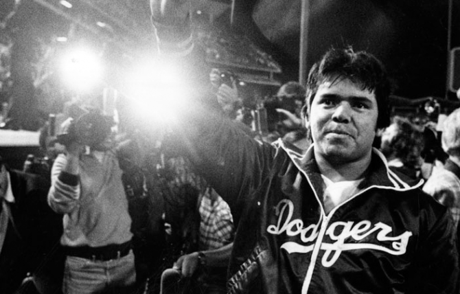 Dodger pitcher Fernando Valenzuela waves to his adoring fans at the height of “Fernandomania” in 1981. Rob Brown/Herald Examiner Collection