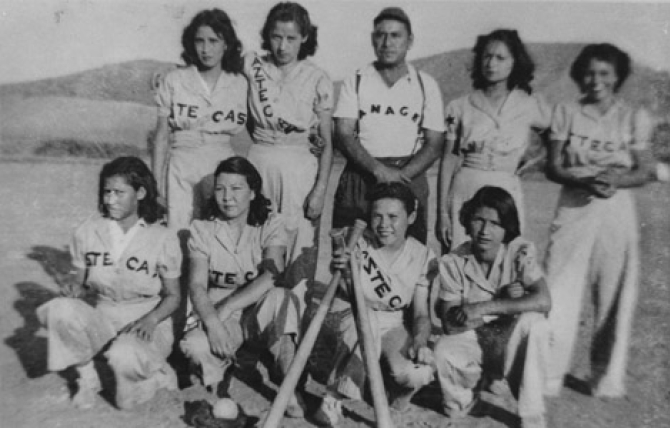 Group portrait of the Aztecas, a girls’ baseball team based in Pacoima, with their manager. Shades of L.A. donor Della Fonseca (later Ortega) is standing, second from right.