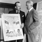 historic black and white photo of artist presenting his designs