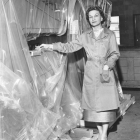 Mrs. Olive Salembier, one of only two women presidents in National Security Industrial Association, inspects packaging job done at SPEC [Specification Packaging Engineering Corp.] Packaging, North Hollywood. Salembier, a packaging engineer worked by the motto, If you want your packaging by noon yesterday, you have to get it here by at least tomorrow.  April 23, 1959.
