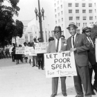 Leon Washington protests the election of the board to oversee Anti-Poverty funds in front of City Hall in 1965. 