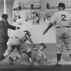 Coach Leo Durocher signals safe as Dodger Maury Wills slides under the tag of Giants third baseman Jim Davenport for yet another stolen base in 1962. George Brich/Valley Times Collection