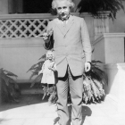 Albert Einstein poses with his portrait puppet, made by Harry Burnett, on the campus of Cal Tech in 1931.