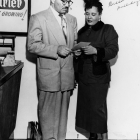 Walter Gordon, Jr., attorney and Shades of L.A. Donor  reviews a document with his client, Billie Holiday.