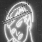 A rare photo captures the famous neon portrait of showgirl Beryl Wallace who graced the exterior of the Earl Carroll Theatre on Sunset Boulevard. (1938, Herman Schultheis Collection)