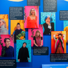 Wall display of photos and quotes representing the Feminist Center for Creative Work, as part of the Something in Common exhibit.