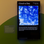 Digital display for the Cloud Appreciation Society, as part of the Something in Common exhibit. The display is titled, "Cloud-a-Day."