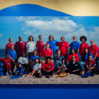 A large photo of the members of the L.A. Black Underwater Explorers, hung on the wall of the Something in Common exhibit.
