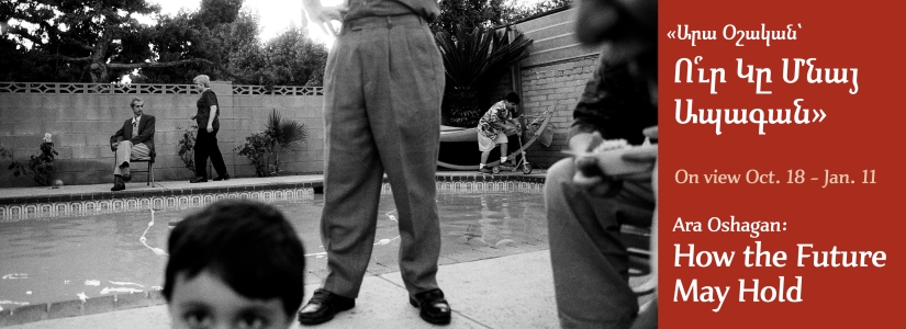 black and white photo of family around backyard pool